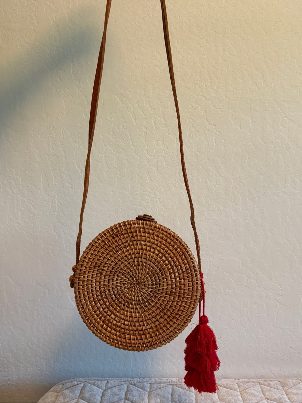 Round Woven Crossbody Bag with Red Tassel